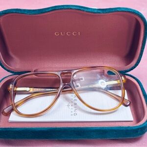 Gucci Tortoiseshell Glasses with Gold Accents